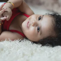 A perfect portrait of a happy and relaxed baby.
