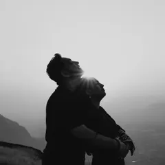 Sometimes, the most powerful moments are the quietest. This black and white silhouette, captured during the golden hour in the hills of Nashik, focuses purely on the connection and shared peace between two people, bathed in soft, natural light.