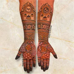 A full-arm engagement design featuring the couple's initials 'NA' and a ring symbol at the top. The rest of the design is filled with floral and peacock motifs.