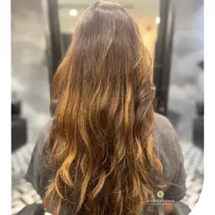 The "before" shot for a stunning transformation, showing how we prepare long hair for a color and style upgrade.
