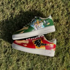 Side-by-side view of the custom One Piece sneakers, highlighting the distinct red and green color schemes for Luffy and Zoro.