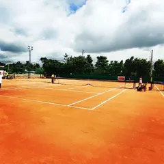 A wide view of my professionally maintained clay courts at the Tennis360 academy, prepared for a day of competitive AITA tournament matches.