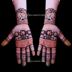 This dark-stained design is perfect for wedding guests. It features a floral band across the palm and a dotted pattern, with a beautiful rose cuff at the wrist.