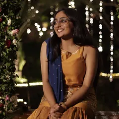 A candid moment at a wedding reception. The beautiful decor with fairy lights and flowers created a magical setting for our performance.