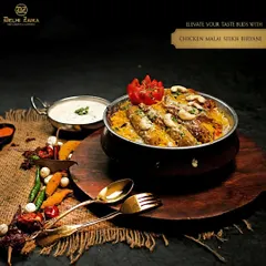 Elevate your taste buds with our Chicken Malai Seekh Biryani, a royal indulgence where succulent kebabs meet aromatic rice.