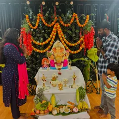 A moment of prayer and devotion with my family during the festival at the studio. We believe in blessings for our space and our members.