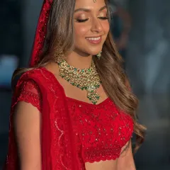 A radiant bride captured during the golden hour at her destination wedding in Dehradun. The dewy bridal makeup I created for her looked absolutely flawless against the natural landscape.