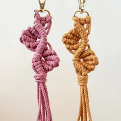 This spiral vine pattern is a unique and elegant keychain design. I make these in earthy tones like dusty pink and mustard, perfect for a subtle, handmade accessory.