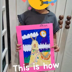 This young artist is celebrating her accomplishment after finishing a detailed llama drawing. That feeling of bringing an idea to life is what makes our classes so rewarding for children.