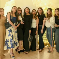 Our community is the heart of the studio. This photo from our anniversary party captures the vibrant and friendly spirit we cultivate. Our space easily accommodates groups for social gatherings and celebrations.