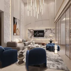 For this modern double-height family lounge, I used a statement chandelier to draw the eye upward. The design combines a neutral color palette with bold blue armchairs and textured wall panels for a cozy yet chic feel.