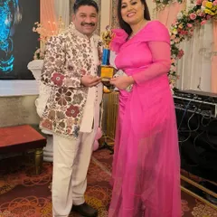 Here is the same floral jacket being worn by a client at an awards function. It shows how a single statement rental piece can be styled for different types of formal events.
