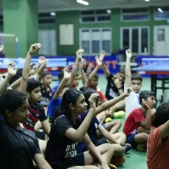 Young players and their parents actively participating in our 'Unlock Your Confidence' session. We believe in a collaborative approach where parents, coaches, and players work together for holistic development.