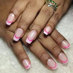 A modern twist on the French manicure with a vibrant pink outline instead of a solid tip. This is a fun, minimalist way to add a pop of color.
