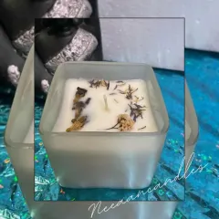 Hand-poured serenity in every flame. This frosted square glass candle is infused with dried botanicals, making it a beautiful and calming experience.