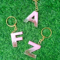 This set of pink and rose gold glitter keychains with the initials 'A', 'F', and 'N' was made for a group of friends. I can create these in any color palette for bulk orders, perfect for party favors or bridesmaid gifts.