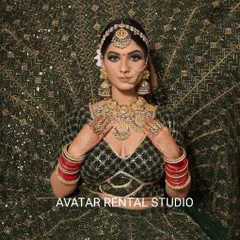 Another angle of this complete bridal look, showing the intricate details of the maang tikka, nath, and layered necklaces.