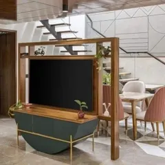 A unique, freestanding TV unit that also acts as a subtle partition. The curved base cabinet and open wooden frame provide a stylish and airy alternative to a solid wall unit.