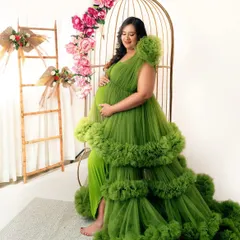 The texture and volume of this ruffled green gown are simply spectacular. I love how it fills the frame, creating a look of pure opulence and joy.