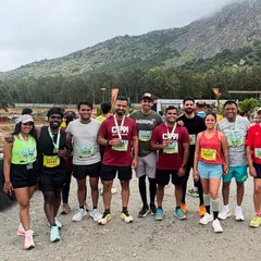 "If you want to go far, go together." Our team standing proud after a challenging outdoor event, with medals to show for our hard work.