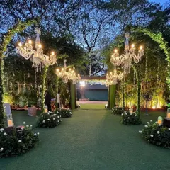 We create magical beginnings with enchanting entrance walkways. Here, lush greenery and elegant crystal chandeliers guide you and your guests into a world of celebration, setting a tone of sophisticated romance for the evening ahead.
