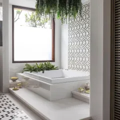 Architectural Digest beautifully captured the essence of the home spa in 'The Lux Casa,' describing it as a space that opens its doors to nature. The feature noted the use of stone and Sicis mosaics to add texture and personality.