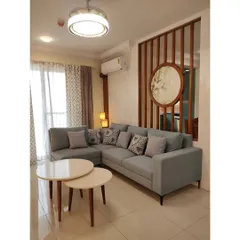 I believe a living room should be a quiet promise of comfort and elegance. Here, a custom L-shaped sofa, nesting tables, and a unique slatted partition with delicate artwork come together to create a space for conversations, dreams, and cherished moments.