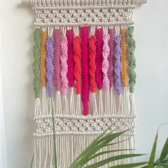 This is another version of my colorful abstract wall hanging, featuring a palette of pinks, purples, and greens. Each piece is unique, depending on how the colors inspire me that day.