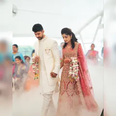 Making a grand entrance. We used a fog machine to create this beautiful cloud effect for the couple as they walked in for their engagement ceremony, making the moment feel like a fairytale.