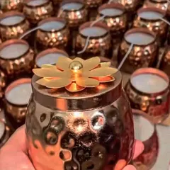 Our metal matki candles are back in stock. This beautiful piece combines a metallic finish with a floral lid, making it a stunning decorative item and a wonderful gift.