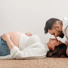 Your own clothes, your own story. A maternity session doesn't always require a gown; sometimes the most beautiful portraits come from simple, relaxed moments in a favorite pair of jeans.