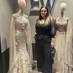 At the new store opening for Elisha Wadhwani, surrounded by her stunningly detailed luxury designs. My role is to make sure the launch event is as elegant and impactful as the couture on display.