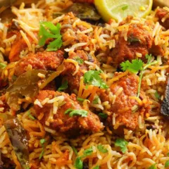 My Chicken Biryani is pure comfort in every spoonful. I prepare it with tender chicken pieces and long-grain basmati rice, slow-cooked with my special blend of homemade masalas. It's a favorite for corporate lunches and weekend parties.