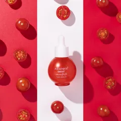 A bold, graphic composition for a bold product. We used a tri-panel background of red and white to frame the serum bottle, with fresh cherry tomatoes adding a pop of natural color and reinforcing the key ingredient story.