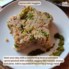 A comforting and healthy breakfast: Upma with lots of veggies. This bowl of semolina is packed with carrots, beans, and peas, with a squeeze of lemon for a tangy twist.