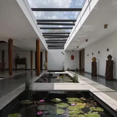 We feature spaces that bring the outdoors in. This home in Kottayam by Thomas Parambil Architects dissolves the boundaries between interior and landscape with a serene, sky-lit water court filled with lilies, creating a tranquil heart for the home.