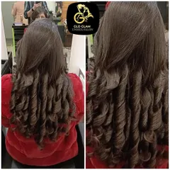 A beautiful combination of a rich hair colour and bouncy curls. This style adds so much volume and texture, making the colour look dynamic and vibrant.