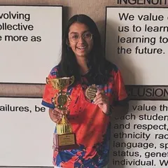 Here is a closer look at our national champion, Naina Rekhi, holding her first position trophy and medal from the ISSO National Championship. Her success in the Under 14 Girls category inspires all our players.