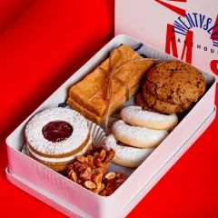 Our Christmas Cookie Tin is filled with five holiday classics from around the world, making it the perfect gift or treat for yourself.