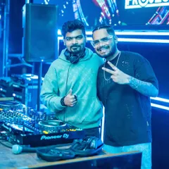 Back at the club after a break, sharing a moment with a fellow artist. The DJ community in Bangalore is vibrant and supportive.