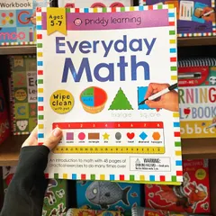 Making math accessible and fun is easy with our "Everyday Math" workbook. Designed for ages 5 to 7, it introduces concepts like shapes and fractions through colorful, practical exercises.