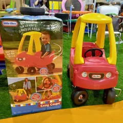 The classic Little Tikes Cozy Coupe is a favorite for a reason. This foot-powered car is perfect for indoor or outdoor play, encouraging active fun and imagination.