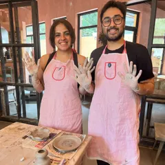 Look at those happy, muddy hands. Our taster sessions are perfect for a fun outing with a friend or partner. You'll both leave with a handmade piece and a great memory.