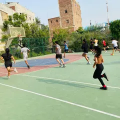 Players sprint across the court, working on their speed and acceleration.