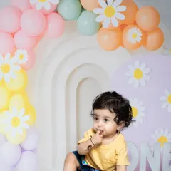 A thoughtful moment amidst the cake chaos. This baby is contemplating his next move.