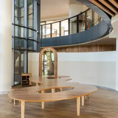 At Vedanya School, Gurugram, a compact site inspired an imaginative design. Curved forms, double-height volumes, and layered connections create an interconnected environment that encourages movement and exploration for young learners.