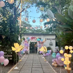 The entrance to this party is lined with glowing floral lights and paper lanterns, creating a magical path for guests to follow. It sets a beautiful tone for the celebration ahead.