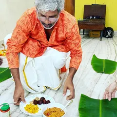Here I am, preparing for an Onam Sadya at home. I believe in the personal touch, so I prepare and serve every dish myself, ensuring the meal is authentic and made with care.