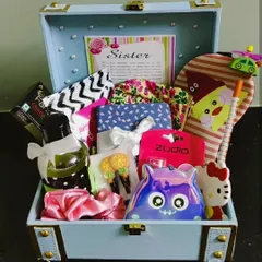 The cutest hamper for the best "Sis-star". This trunk is overflowing with fun and quirky items like cute socks, a unique coin pouch, and fun stationery.
