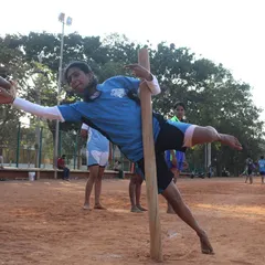 Our female players are just as fierce. This action shot shows Rakshitha executing a perfect pole touch to maintain her momentum during a chase.